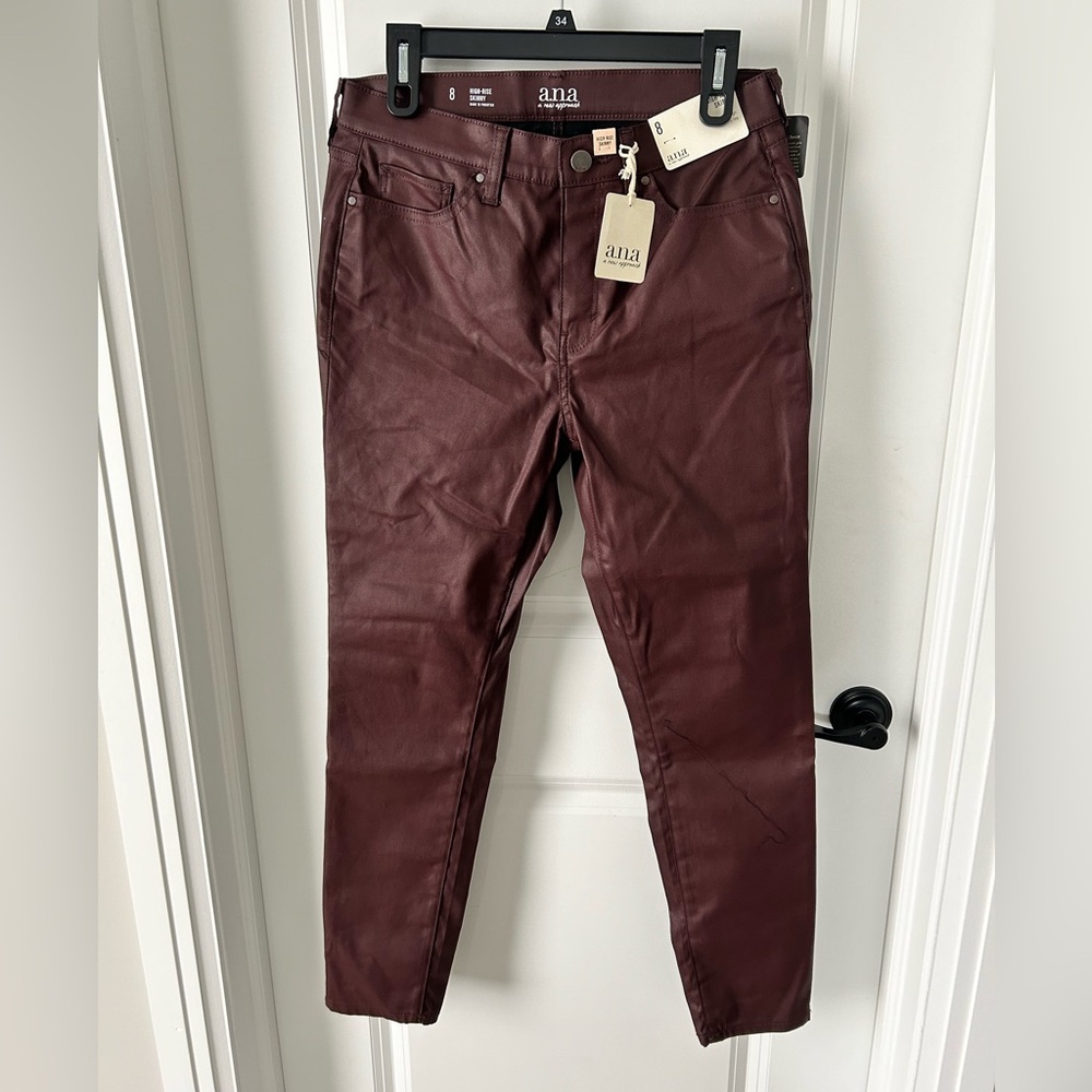 New with tags, never worn, Ana pleather maroon skinny pants.